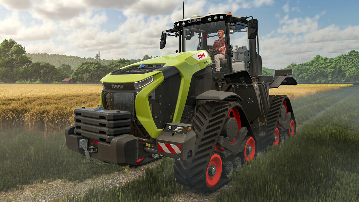 A farmer driving the tractor in Farming Simulator 25